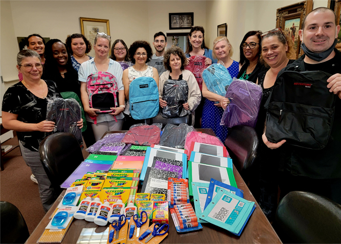 Connors & Sullivan Attorneys At Law PLLC employees donated boxes of school supplies and backpacks for Operation Backpack, a program of Reaching-Out Community Services