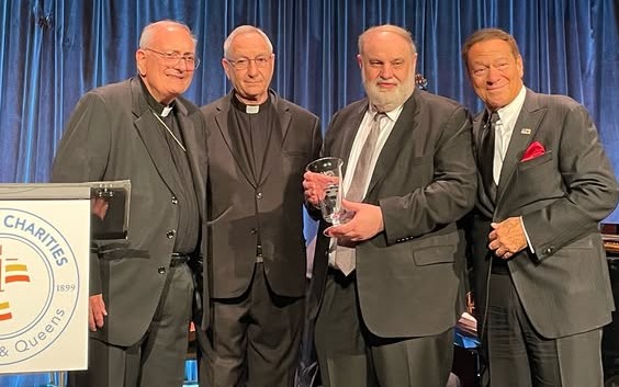 photo of Bishop Nicholas DiMarzio, Rev. Msgr. Alfred LoPinto, Michael Connors, and Joe Piscopo